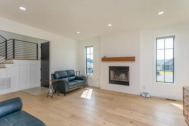 a kitchen with a sink a counter top space and cabinets