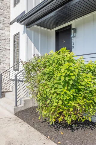 a swimming pool with trees in the background