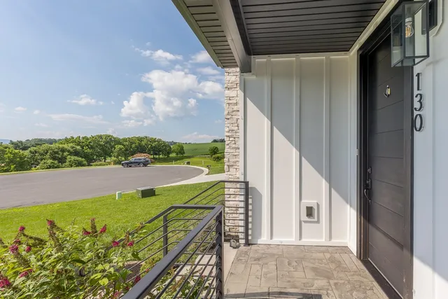 a view of backyard with sitting area