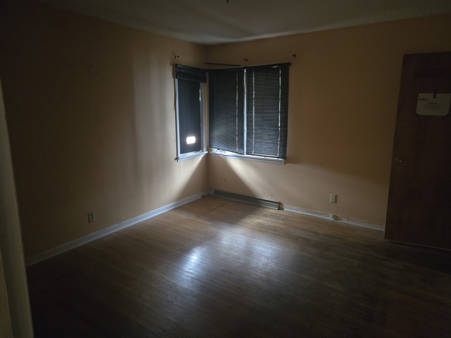 2 Walton Place Normal, IL 61761 - Photo 16 of 41 a view of an empty room with wooden floor and a window