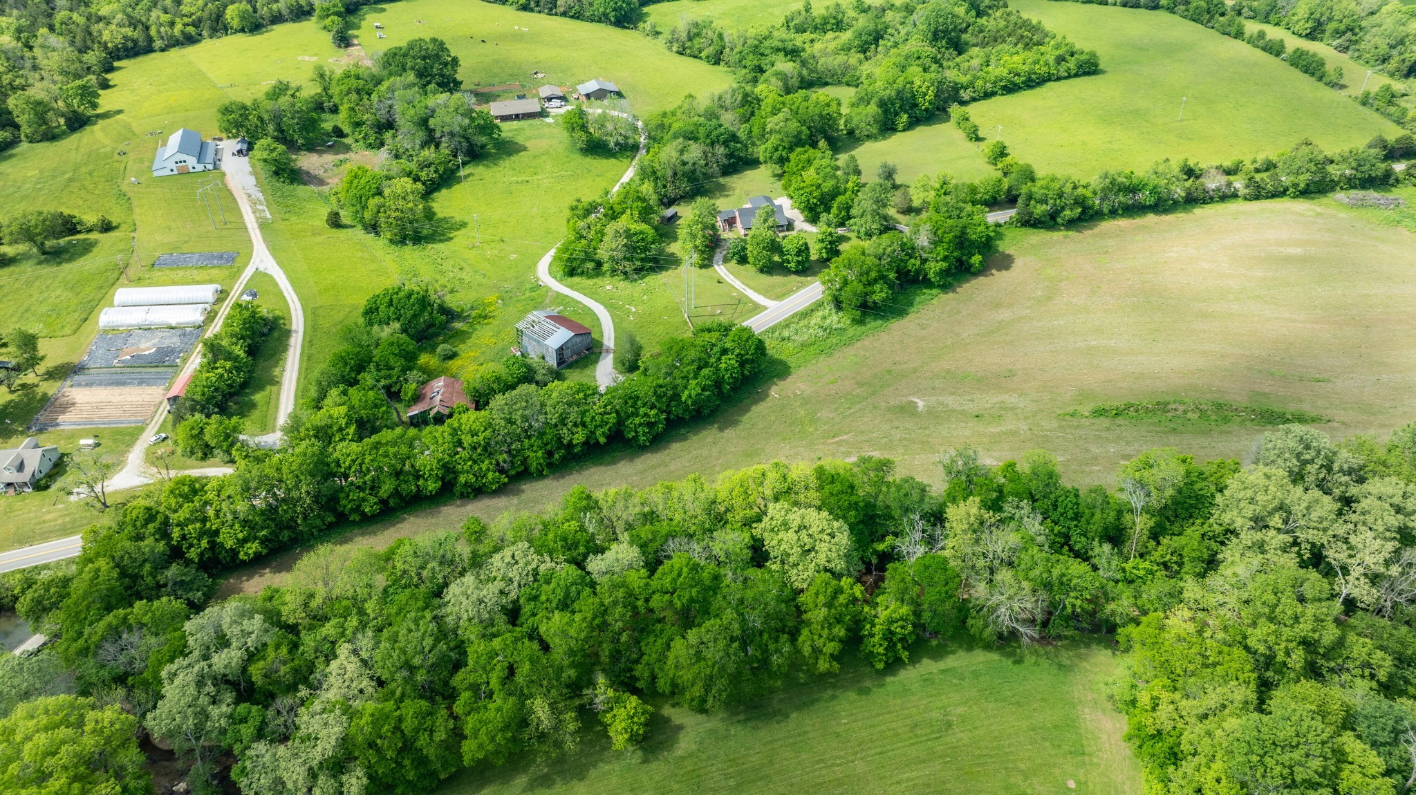0 Snow Creek Road Santa Fe, TN 38482 - Photo 20 of 63 an aerial view of residential houses with outdoor space and trees all around