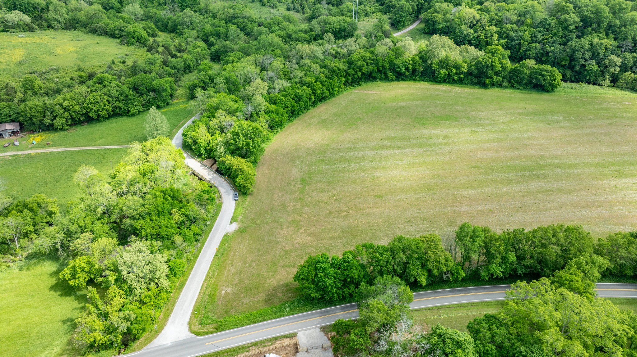 0 Snow Creek Road Santa Fe, TN 38482 - Photo 23 of 63 a view of a garden with a lake
