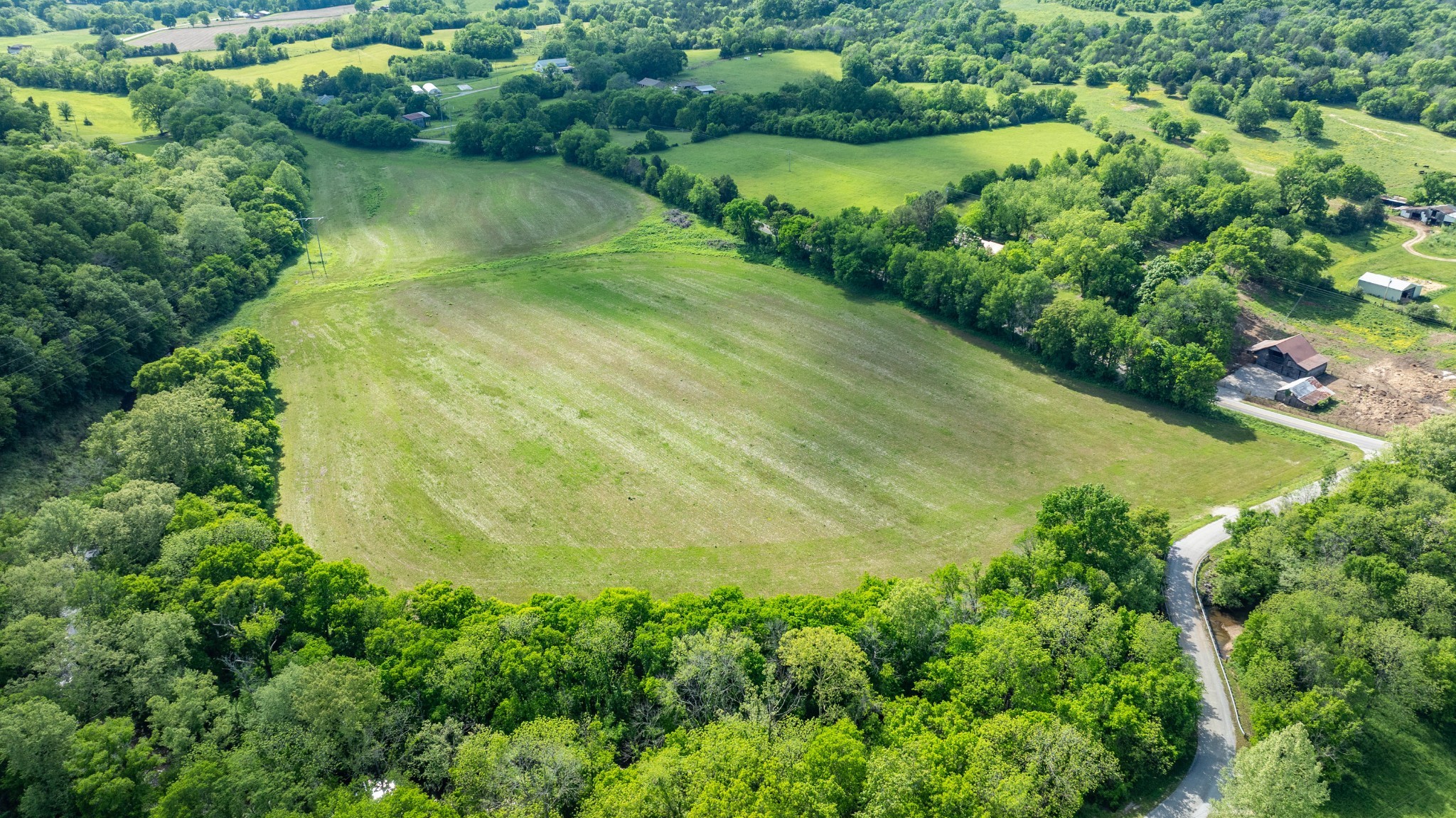 0 Snow Creek Road Santa Fe, TN 38482 - Photo 60 of 63 an aerial view of residential houses with outdoor space and trees