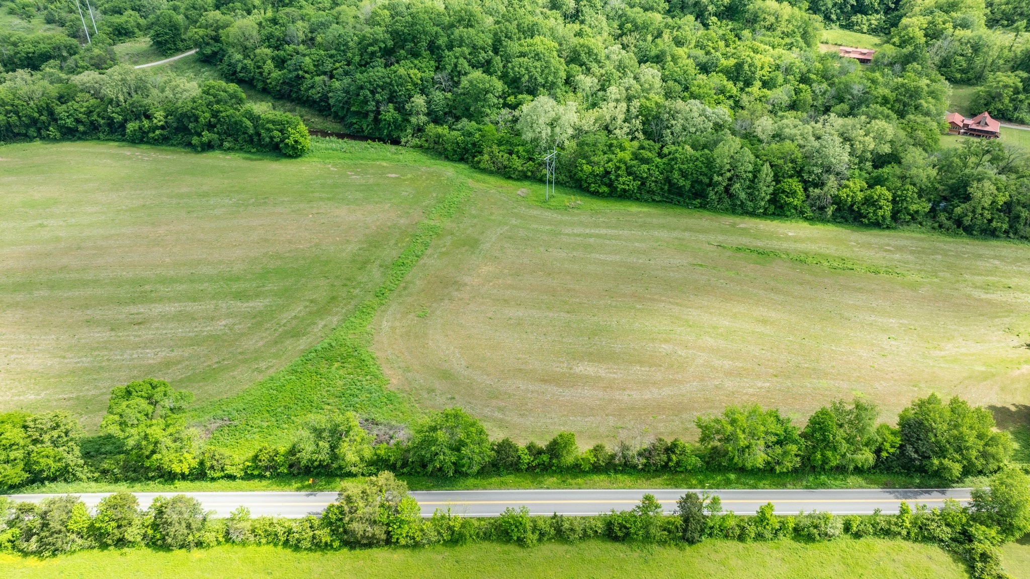 0 Snow Creek Road Santa Fe, TN 38482 - Photo 6 of 63 a view of a garden with a building in the background