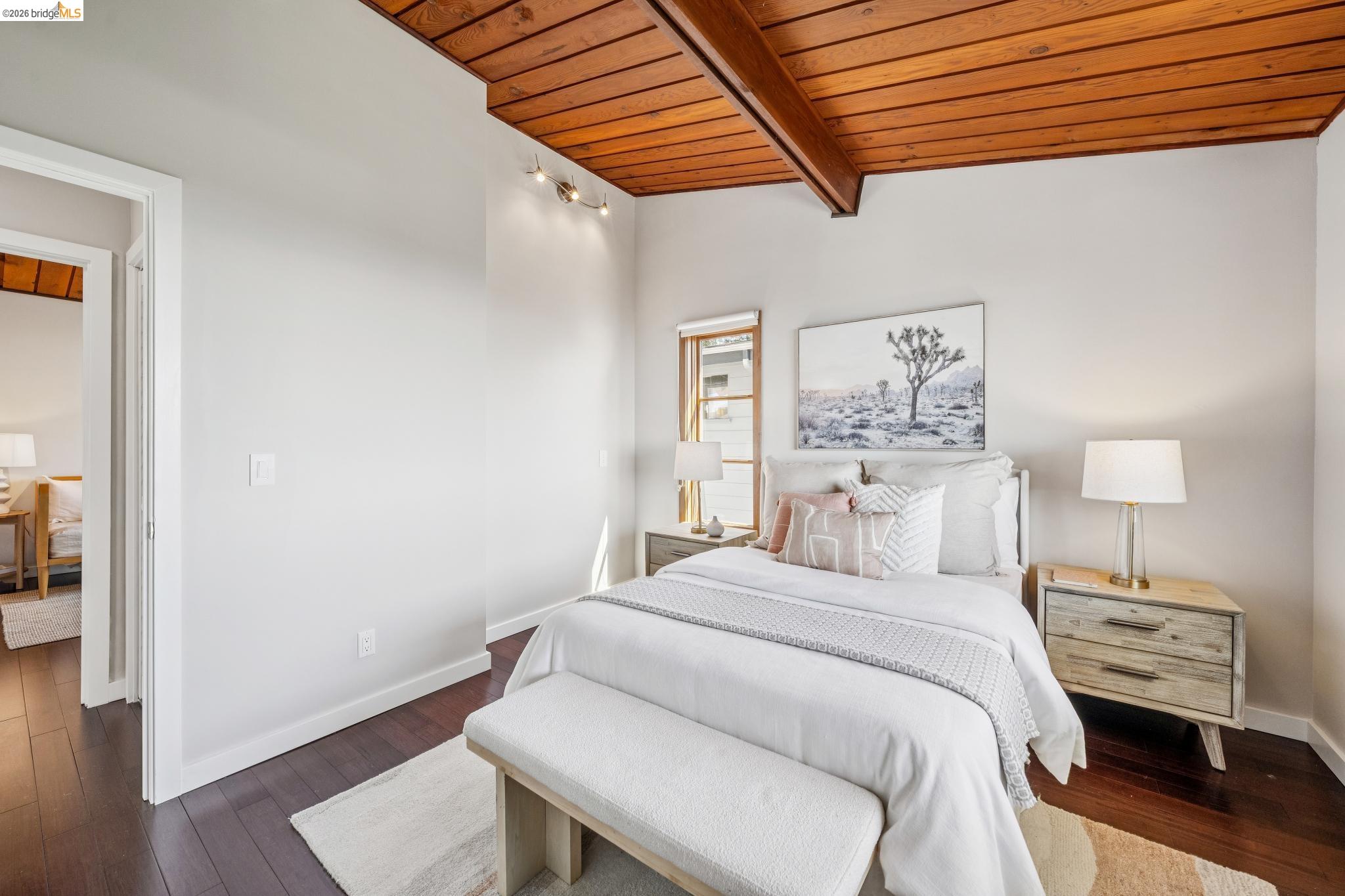 1394 Queens Road Berkeley, CA 94708 - Photo 34 of 63 Vaulted wood-finish ceiling with exposed beams, recessed lighting, wood-finish flooring, and a window with blinds