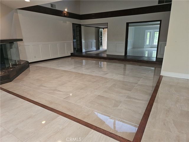a view of a dining room with furniture and window