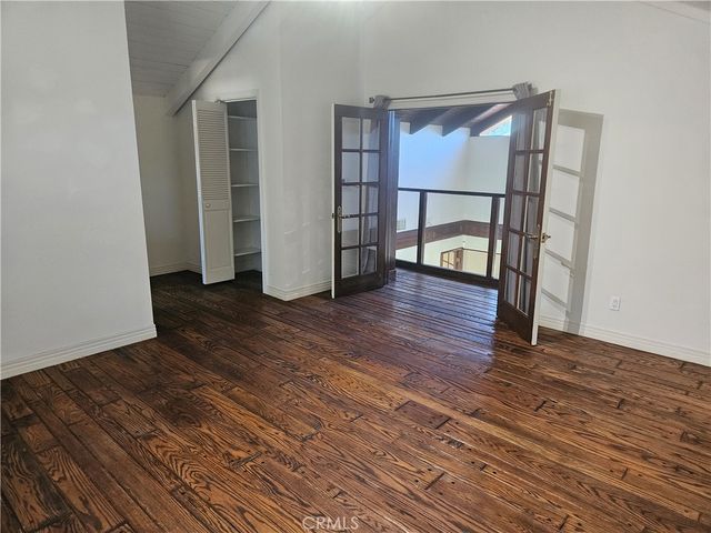 a kitchen with granite countertop a stove and a sink