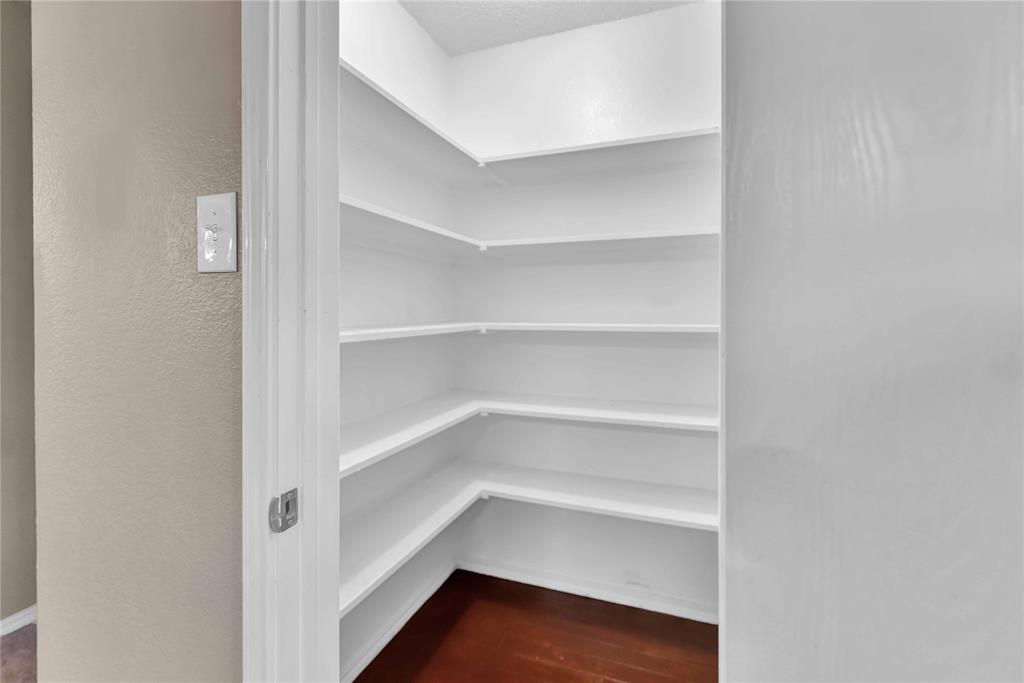 9517 George Washington Drive McKinney, TX 75072 - Photo 16 of 31 a view of walk in closet with empty racks