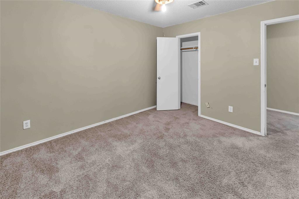 9517 George Washington Drive McKinney, TX 75072 - Photo 24 of 31 an empty room with closet and a window