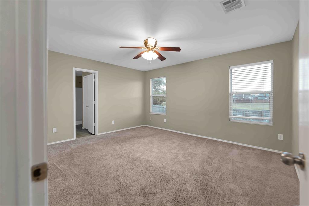 9517 George Washington Drive McKinney, TX 75072 - Photo 10 of 31 a view of an empty room with a window