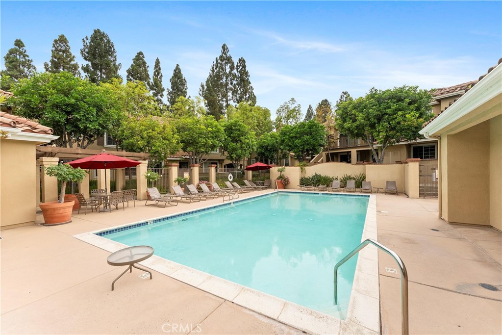239 Gallery Way Tustin, CA 92782 - Photo 30 of 35 a view of a swimming pool with a patio