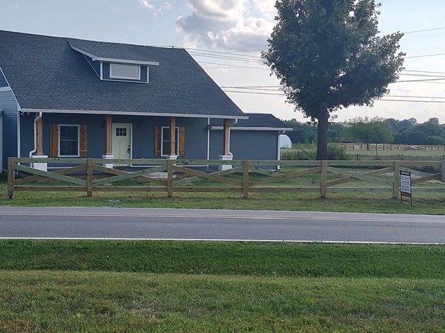434 Fowler Ford Road Portland, TN 37148 - Photo 2 of 45 a front view of a house with a garden