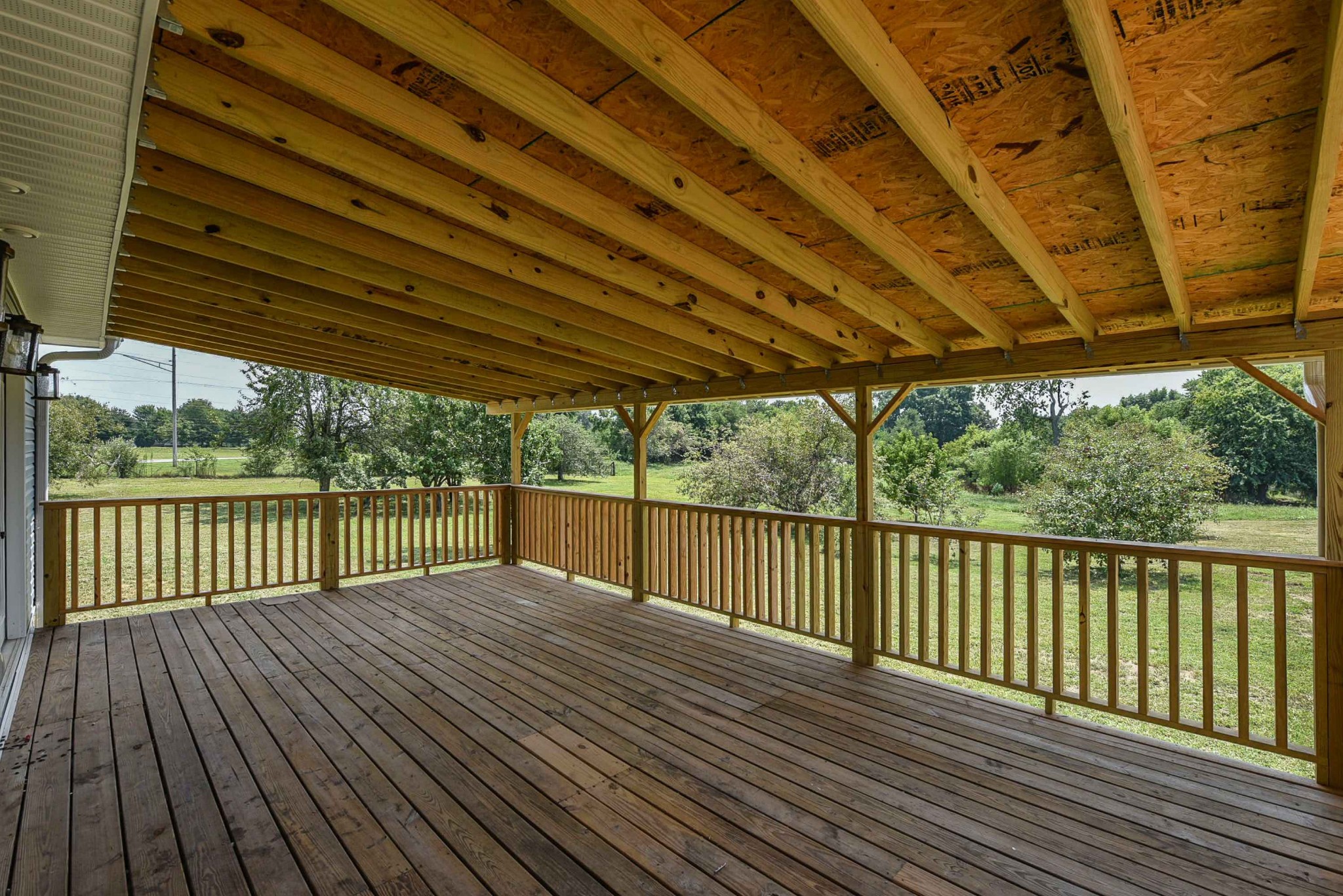 434 Fowler Ford Road Portland, TN 37148 - Photo 11 of 45 a view of balcony with wooden floor