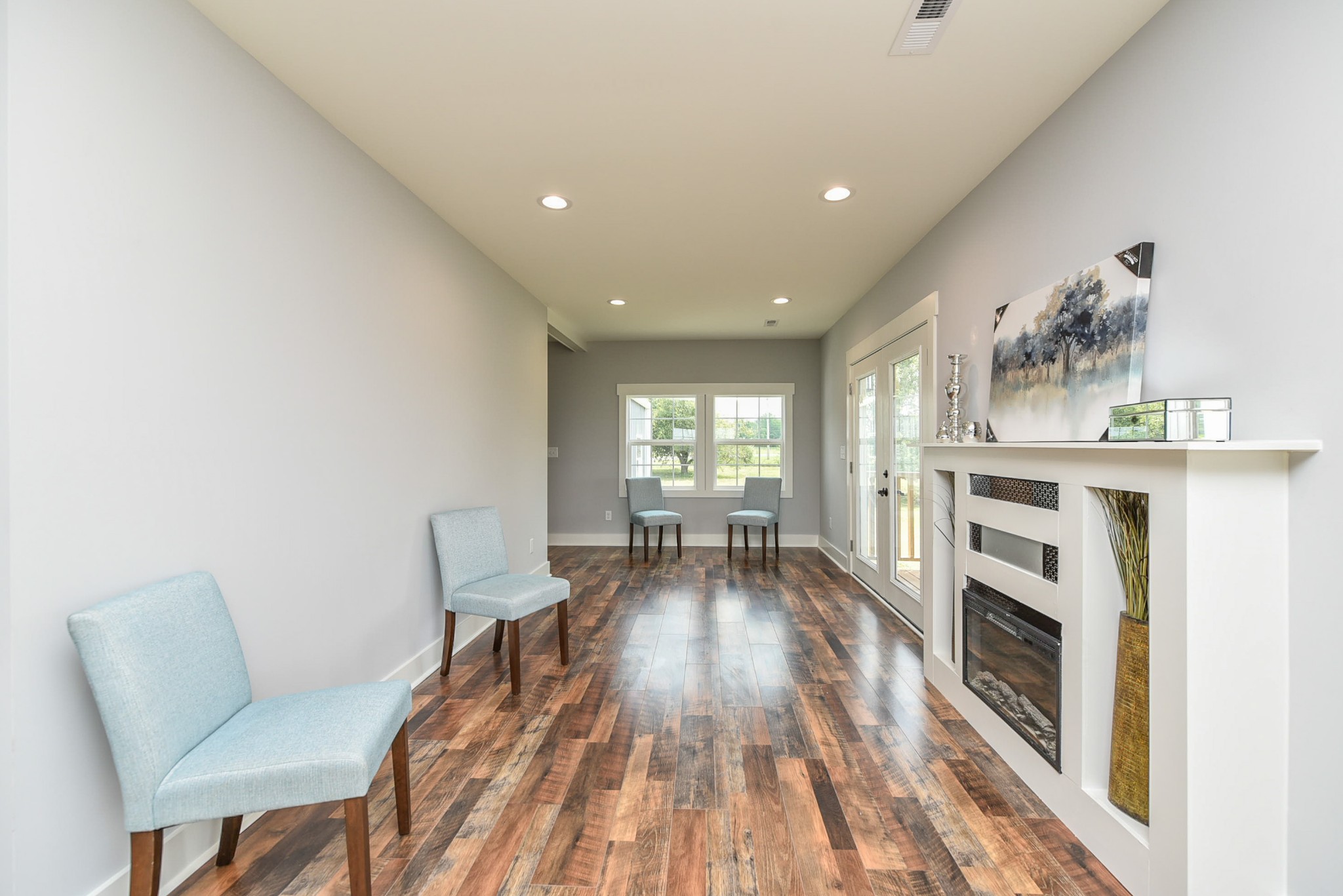 434 Fowler Ford Road Portland, TN 37148 - Photo 20 of 45 a living room with furniture and a fireplace
