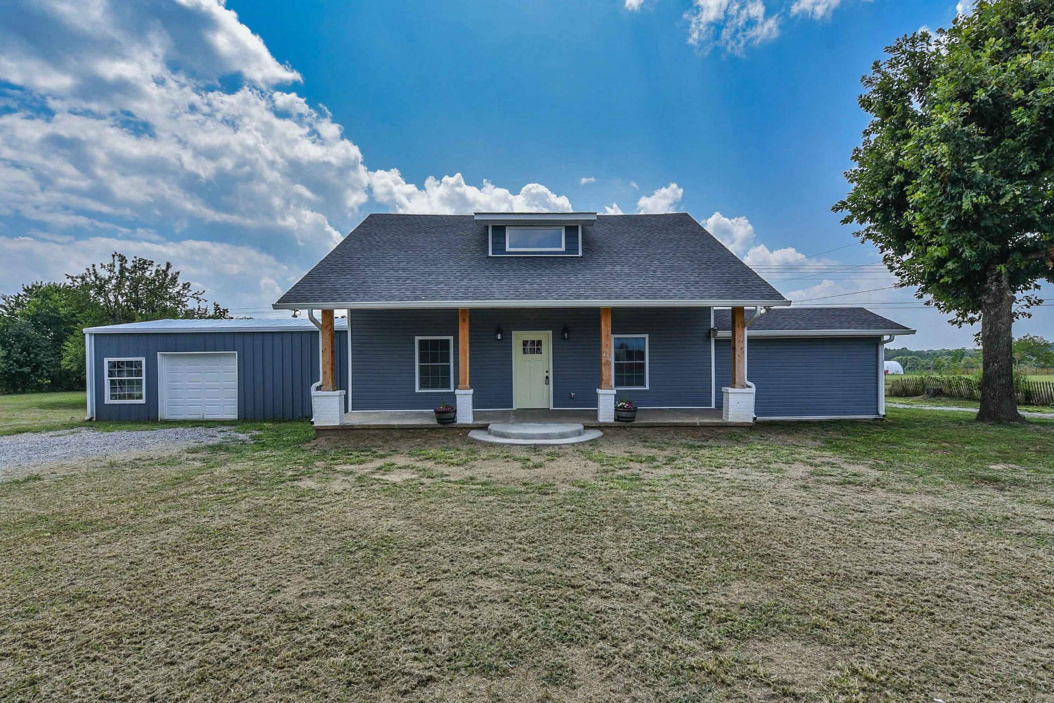 434 Fowler Ford Road Portland, TN 37148 - Photo 3 of 45 a front view of a house with garden
