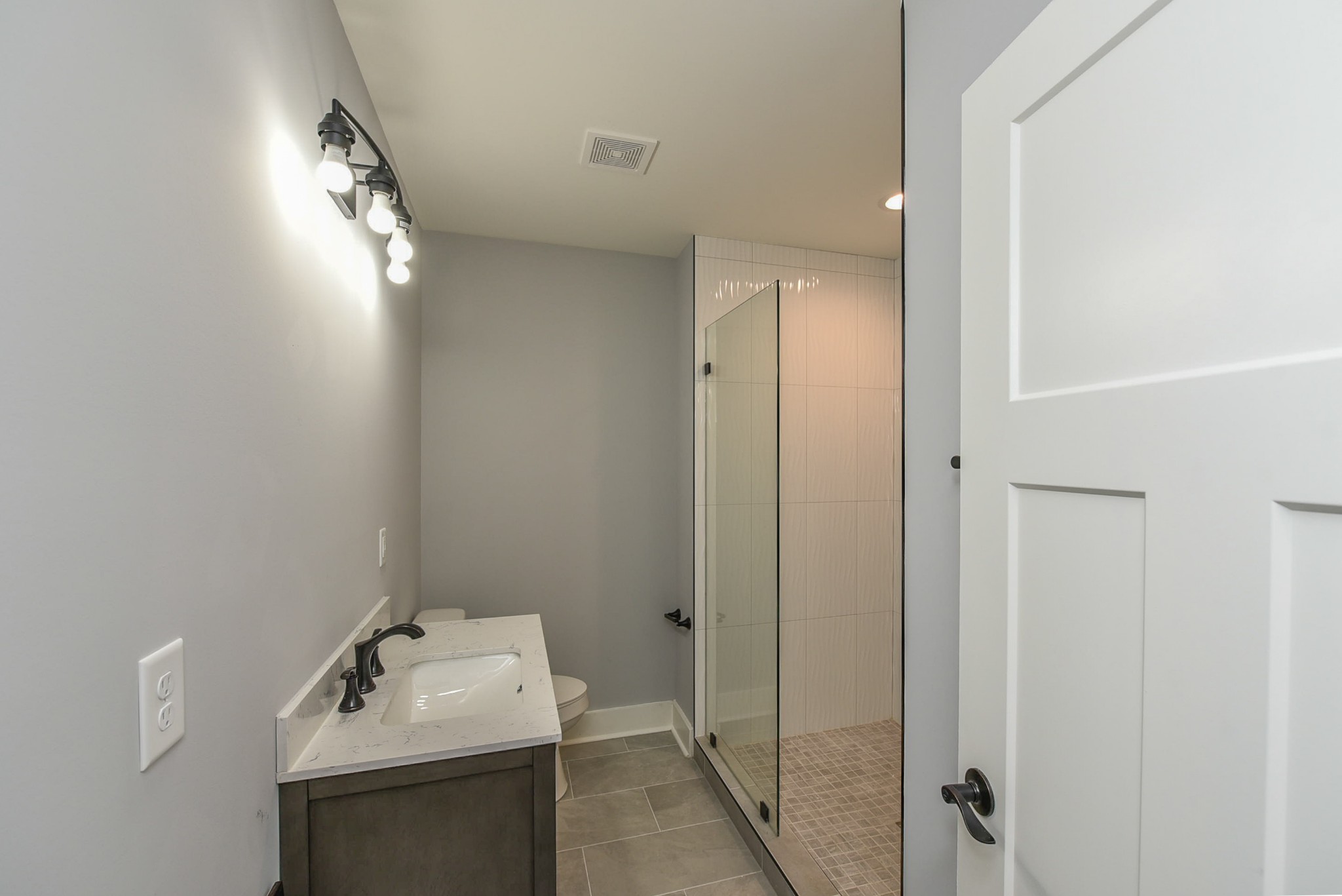 434 Fowler Ford Road Portland, TN 37148 - Photo 27 of 45 a bathroom with a sink and mirror