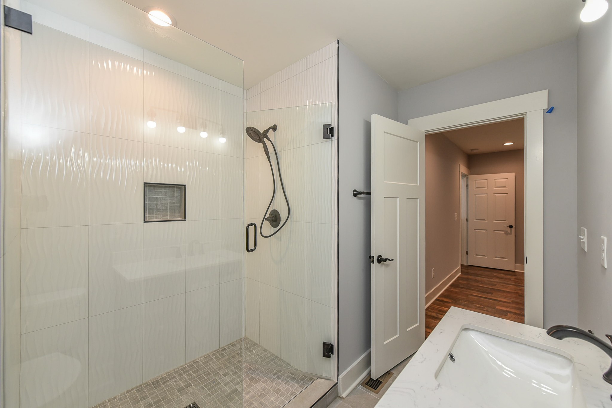 434 Fowler Ford Road Portland, TN 37148 - Photo 28 of 45 a bathroom with a sink and shower