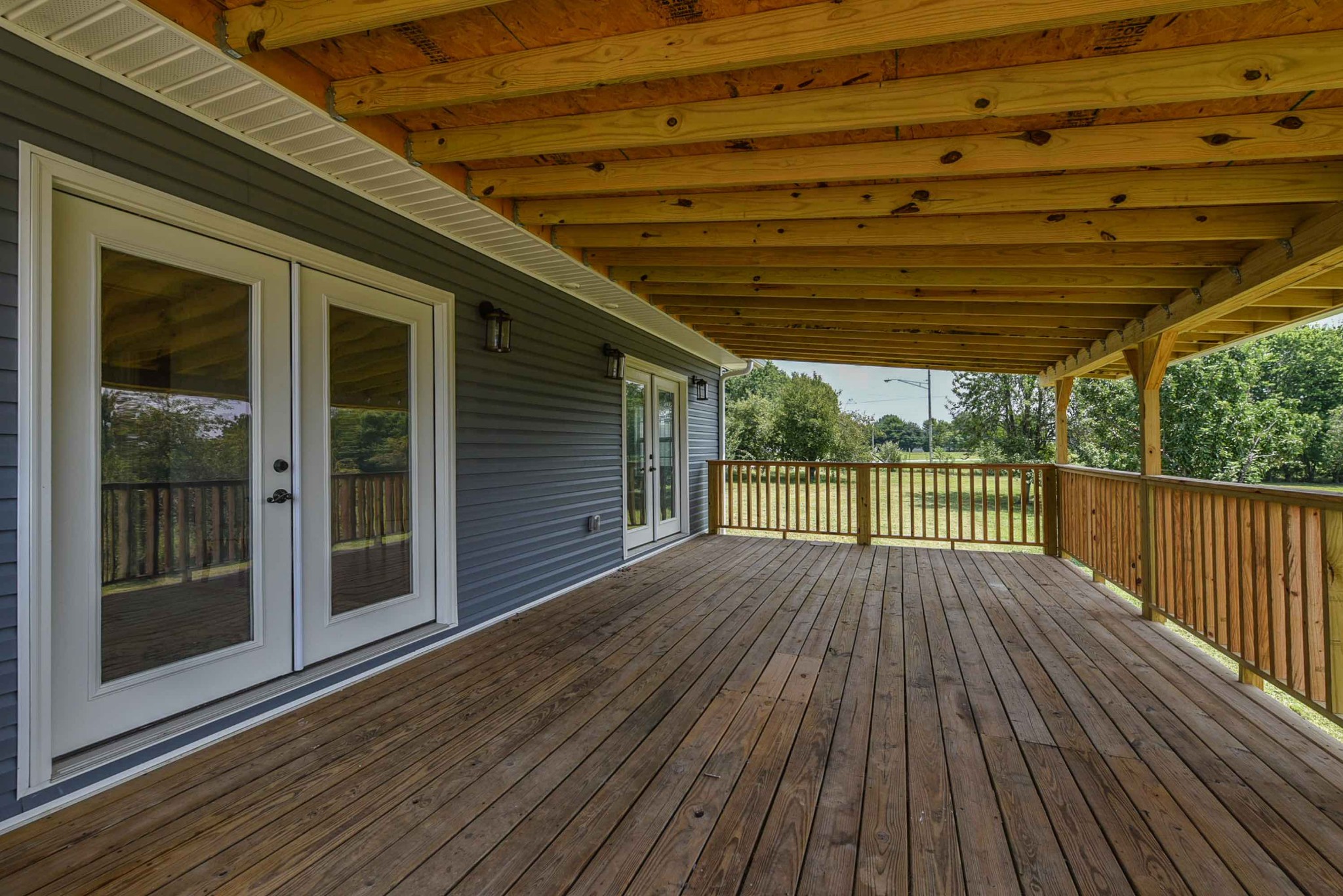 434 Fowler Ford Road Portland, TN 37148 - Photo 10 of 45 a view of backyard with wooden floor