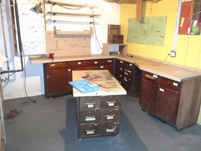 a kitchen with granite countertop a sink and a stove