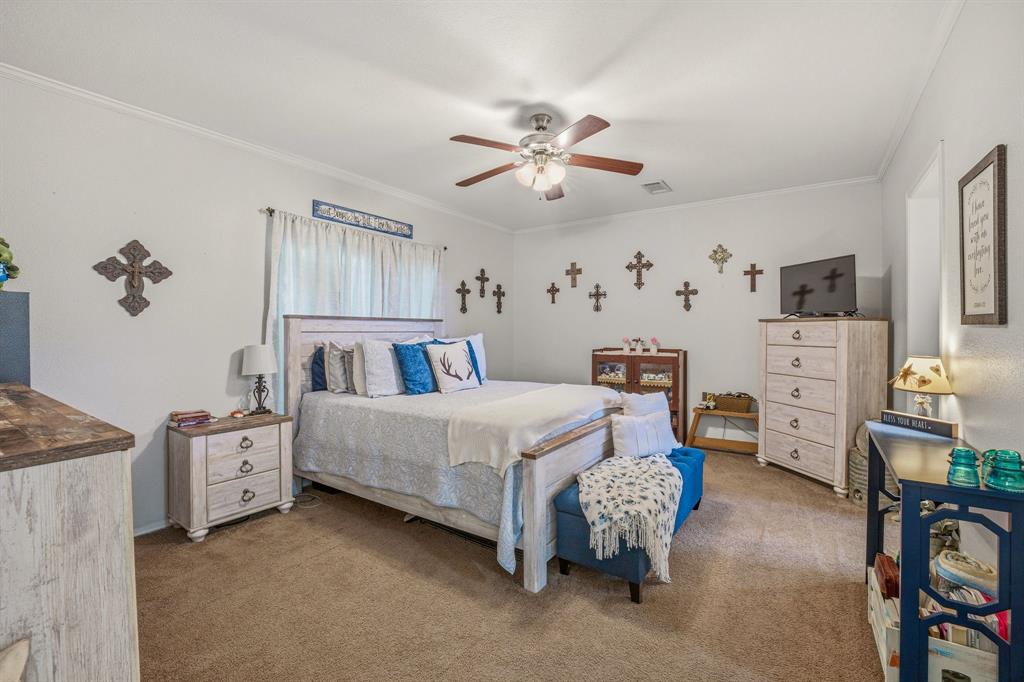 1262 Rosser Ranch Road Graham, TX 76450 - Photo 11 of 39 a bed room with bed and window