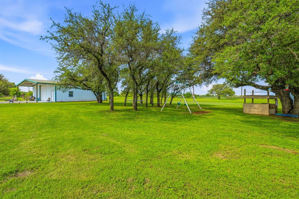 1262 Rosser Ranch Road Graham, TX 76450 - Photo 29 of 39 a view of a park with trees and grass