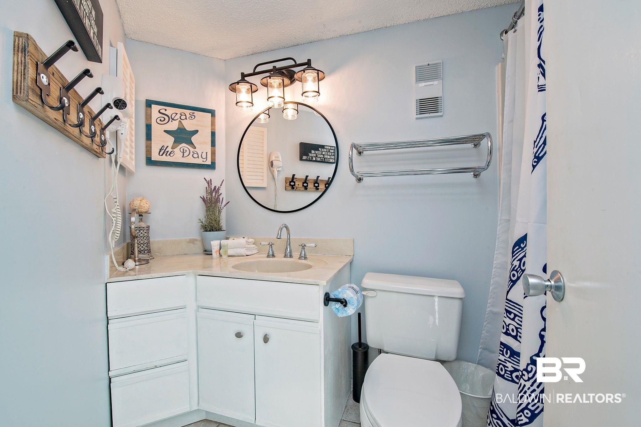 497 Plantation Road, Unit 1156 Gulf Shores, AL 36542 - Photo 14 of 28 Bathroom with walk in shower, vanity, toilet, and a textured ceiling