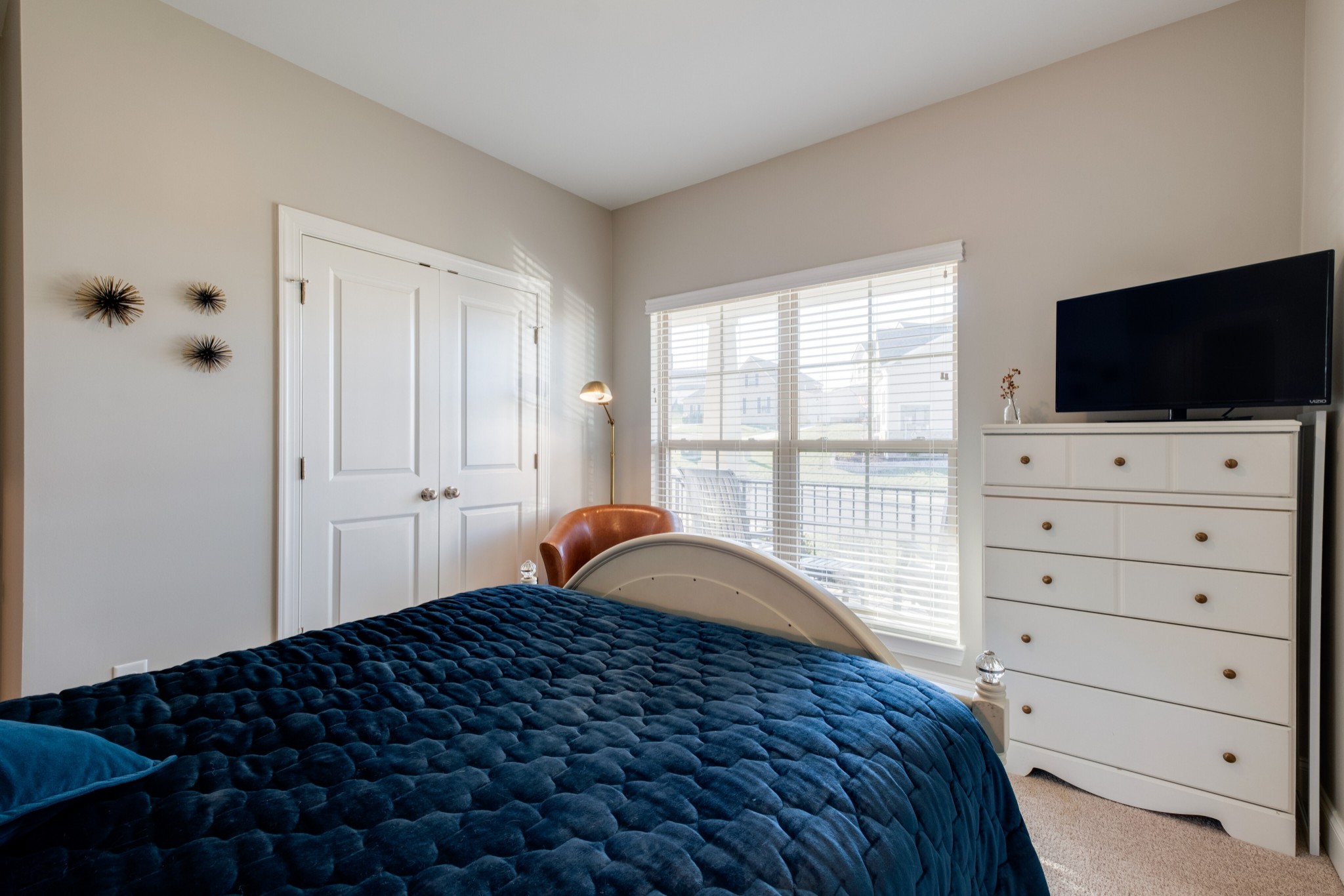 407 Butler Road Mount Juliet, TN 37122 - Photo 22 of 34 a bedroom with a bed and a flat screen tv