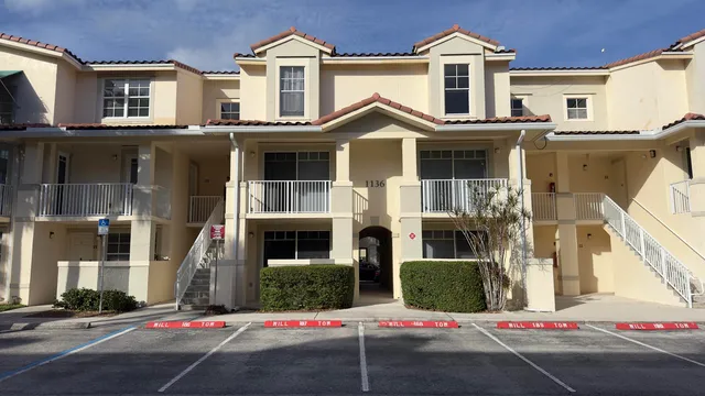 a front view of building with street