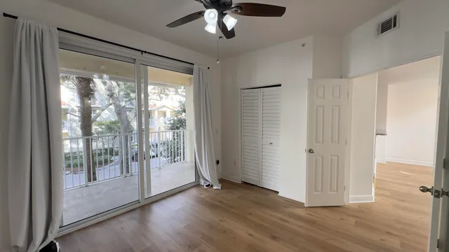 a view of a livingroom with a floor to ceiling window