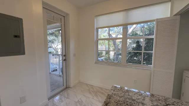 an empty room with windows