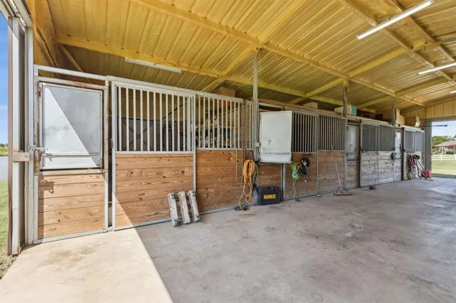 an aerial view of a houses with a lake view