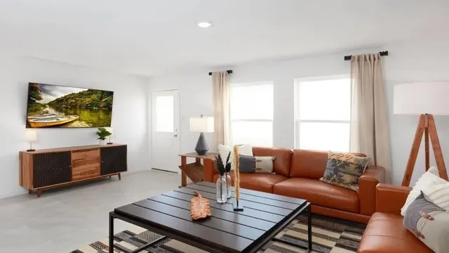 a kitchen with stainless steel appliances granite countertop a stove a sink dishwasher a refrigerator and a oven