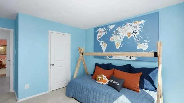 a bed room with furniture and a window