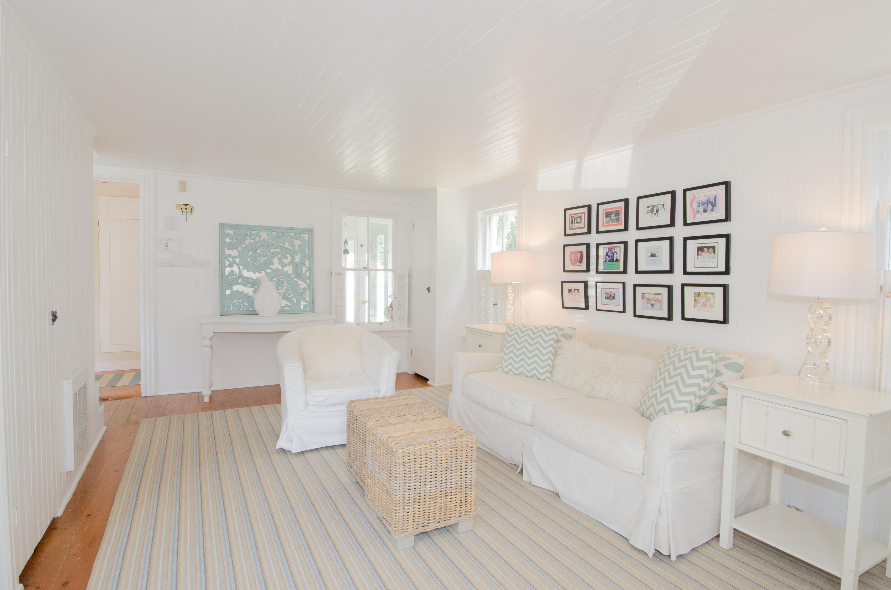 100 Hollow Tree Ridge Road Darien, CT 06820 - Photo 15 of 34 a living room with furniture and a wooden floor