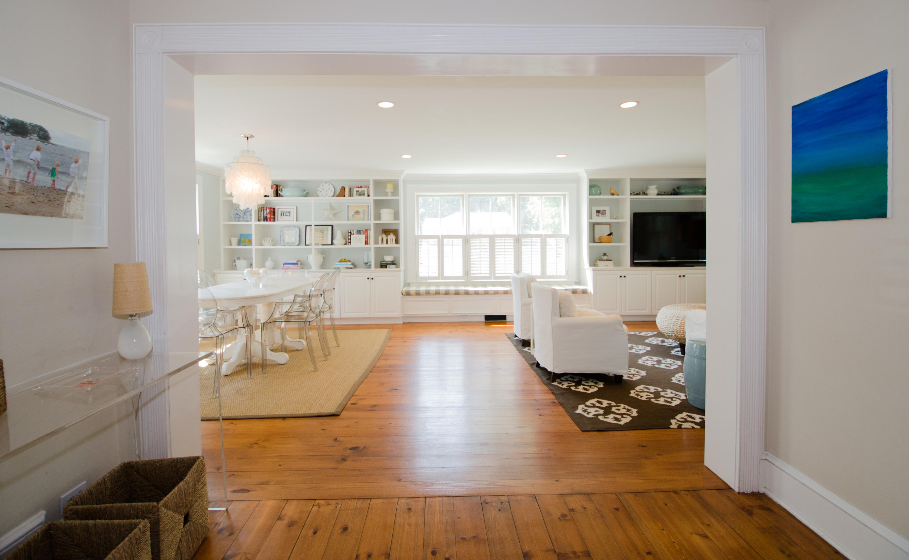 100 Hollow Tree Ridge Road Darien, CT 06820 - Photo 21 of 34 a living room with dining room and wooden floor
