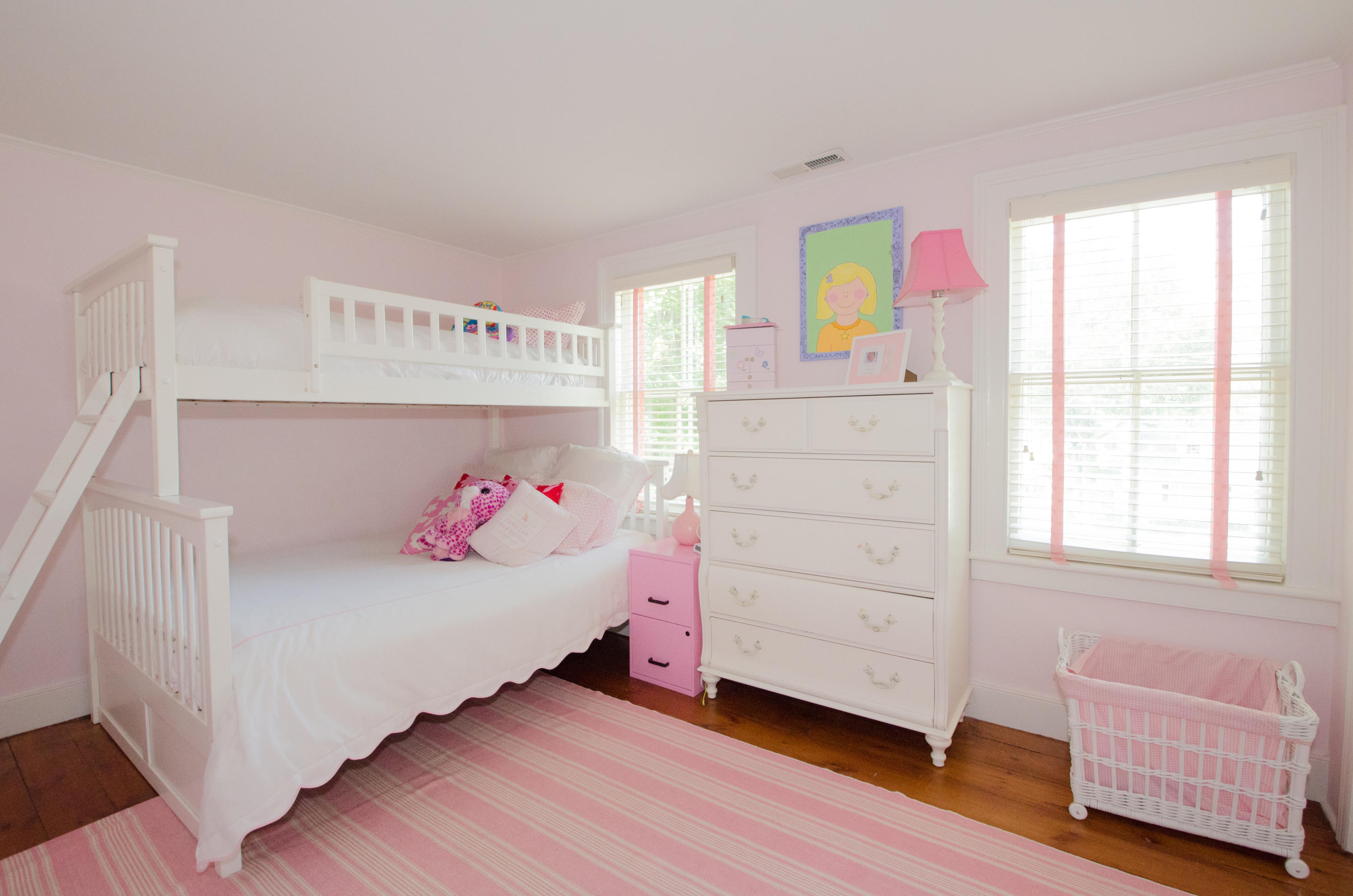 100 Hollow Tree Ridge Road Darien, CT 06820 - Photo 27 of 34 a bedroom with a bed and a window