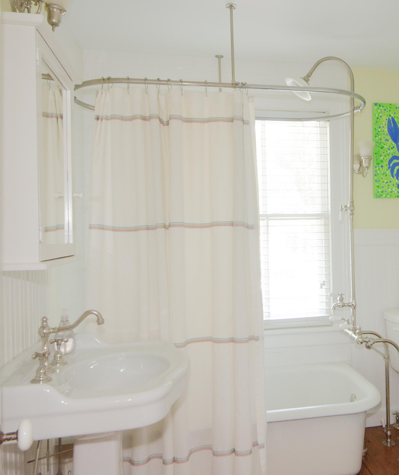 100 Hollow Tree Ridge Road Darien, CT 06820 - Photo 28 of 34 a white bath tub sitting next to a white sink and a shower