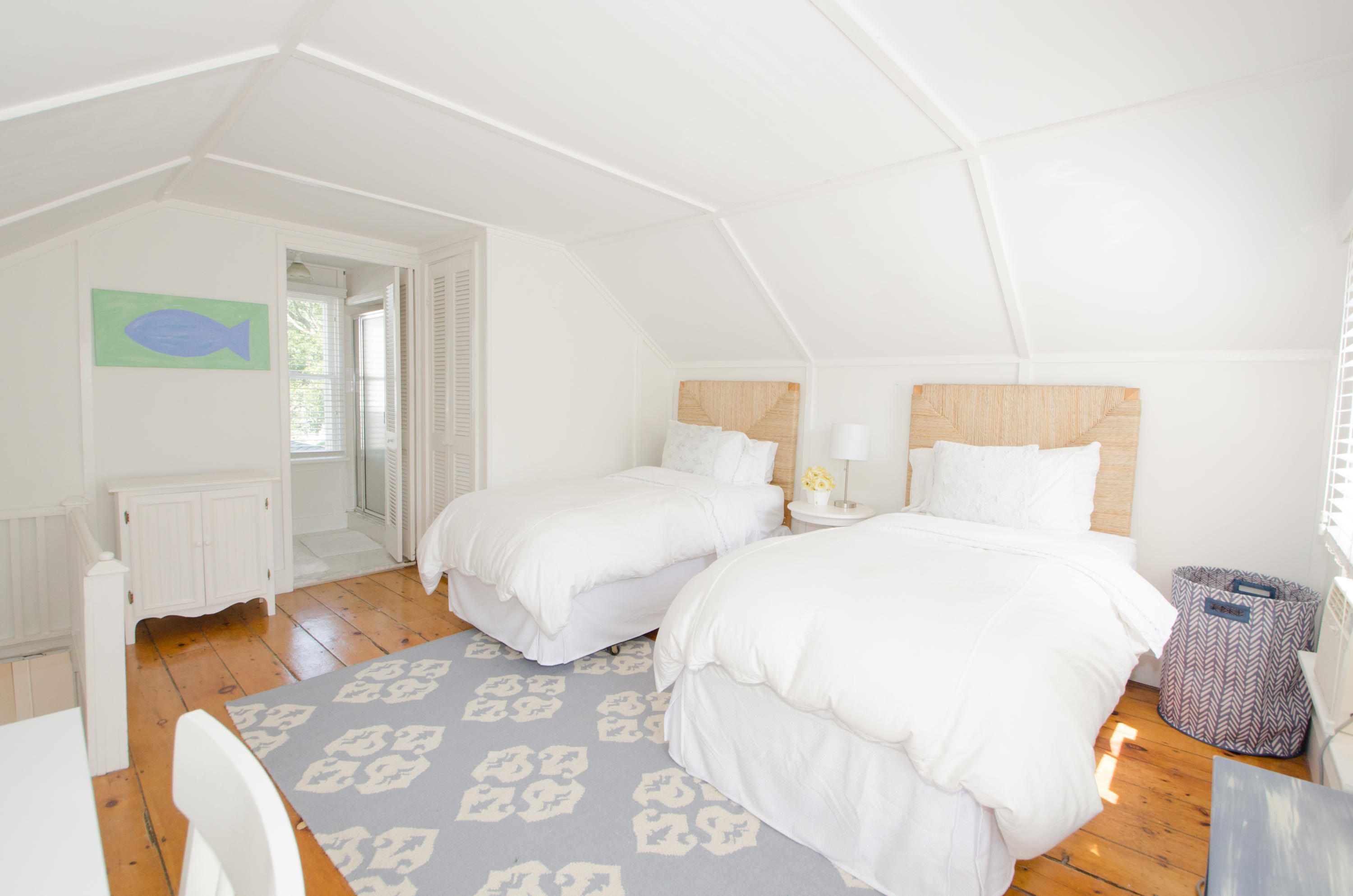 100 Hollow Tree Ridge Road Darien, CT 06820 - Photo 29 of 34 a bedroom with two beds and a window
