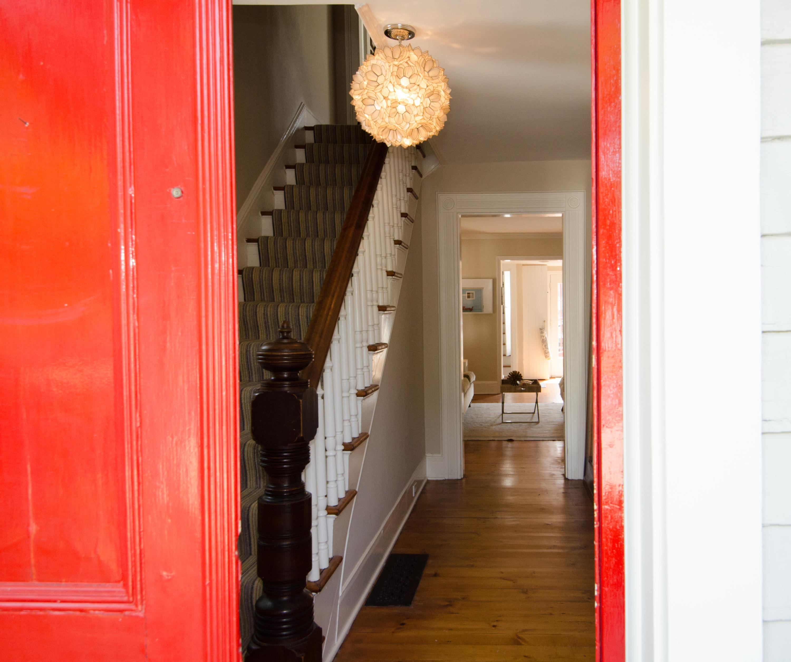 100 Hollow Tree Ridge Road Darien, CT 06820 - Photo 7 of 34 a view of a hallway with wooden floor and entryway