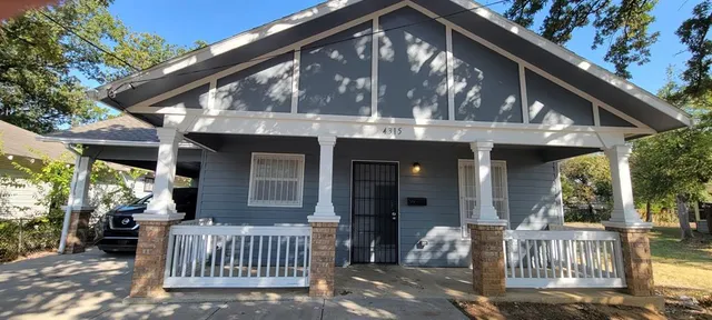a front view of a house with porch