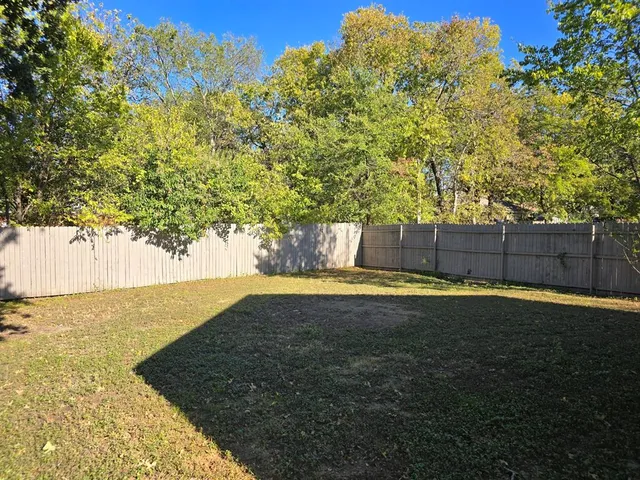 a view of a yard with an outdoor space