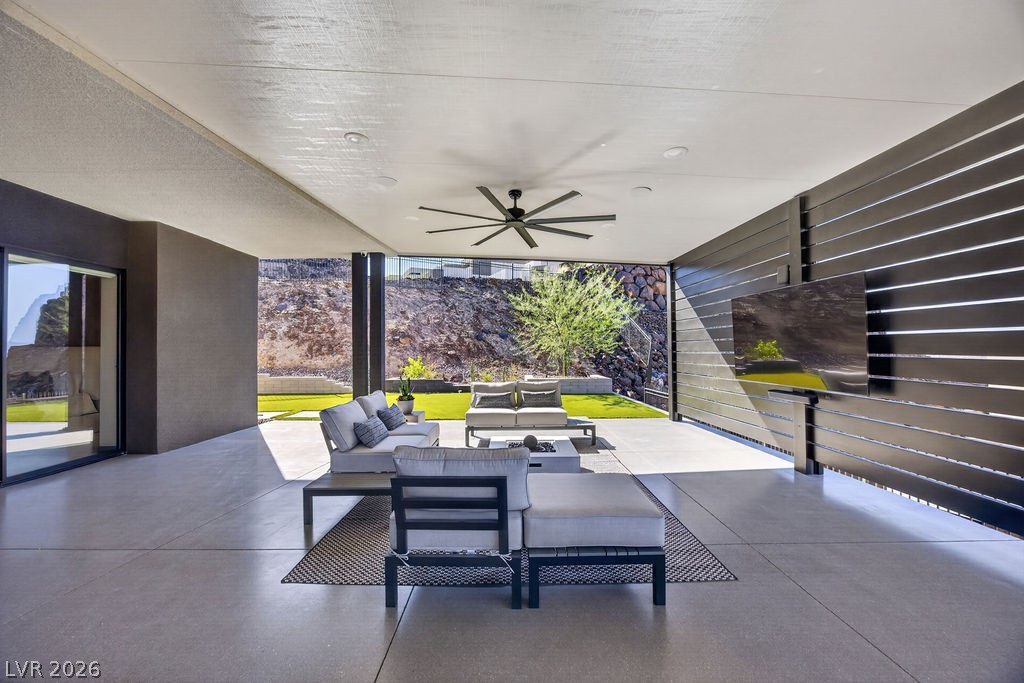 1456 Solitude Ridge Drive Henderson, NV 89012 - Photo 78 of 94 Entertainers Dream Yard with Covered Patio, added Privacy, Ceiling Fan & Television