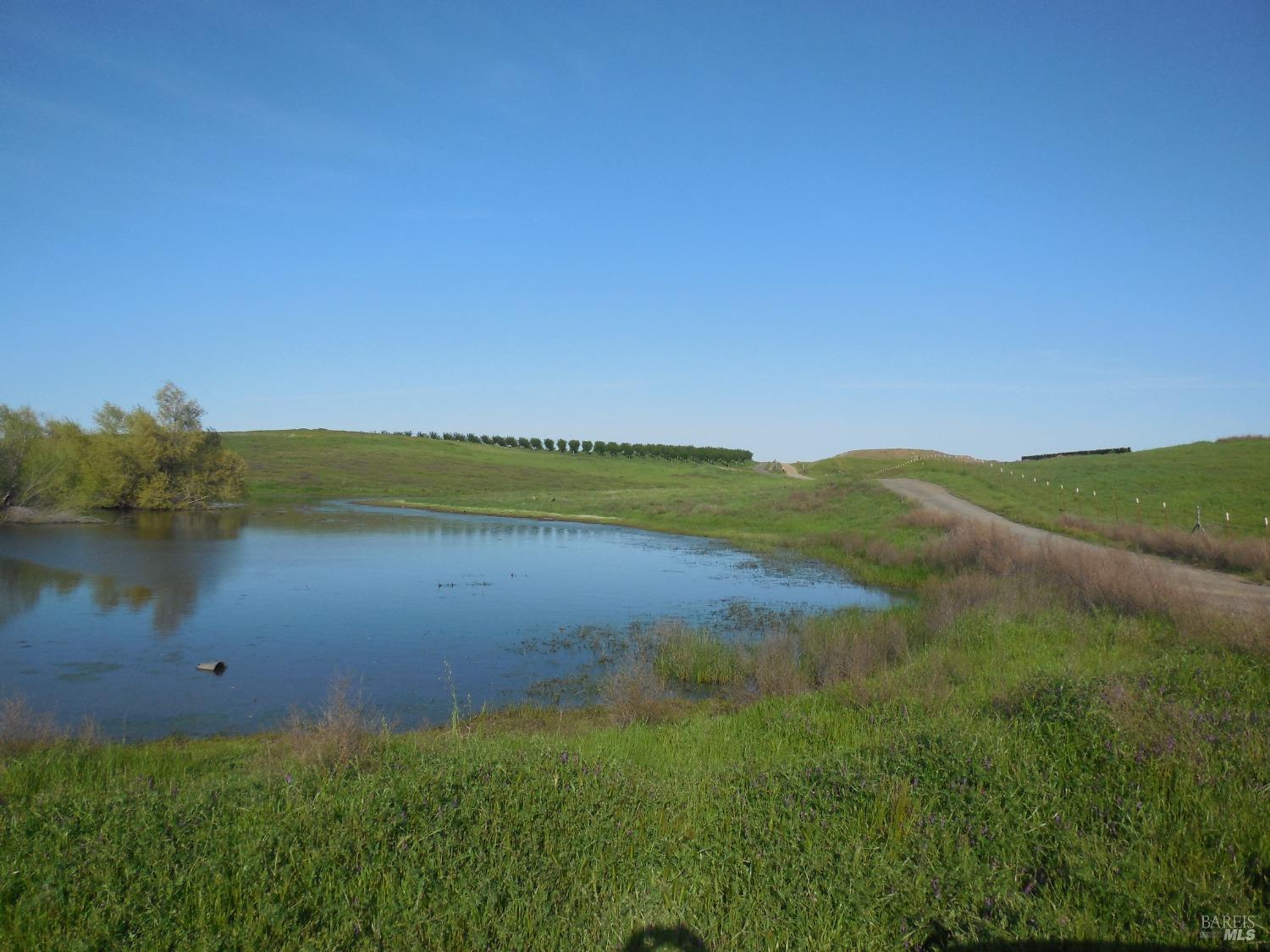 0 Timm Road Winters, CA 95694 - Photo 14 of 22 a view of a lake with a yard