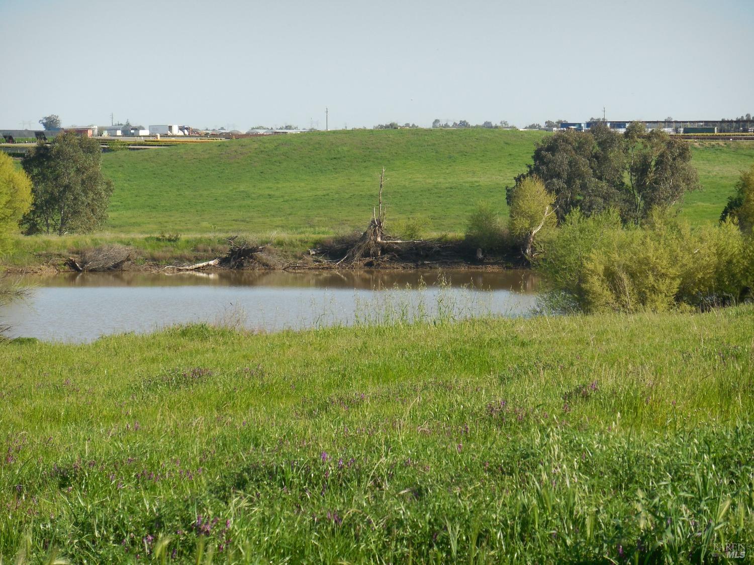 0 Timm Road Winters, CA 95694 - Photo 21 of 22 a view of a lake with a big yard