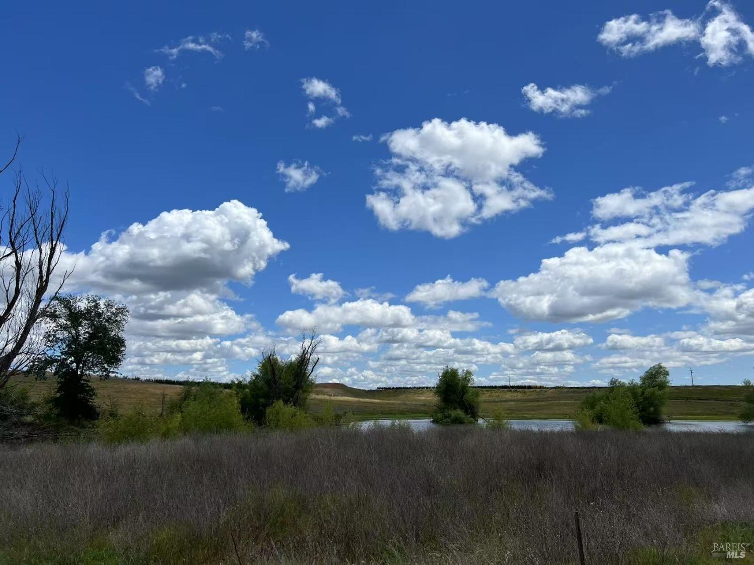 0 Timm Road Winters, CA 95694 - Photo 3 of 22 a view of a lake with lots of green space