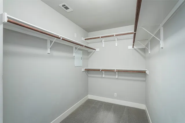a view of workspace with a window and a ceiling fan