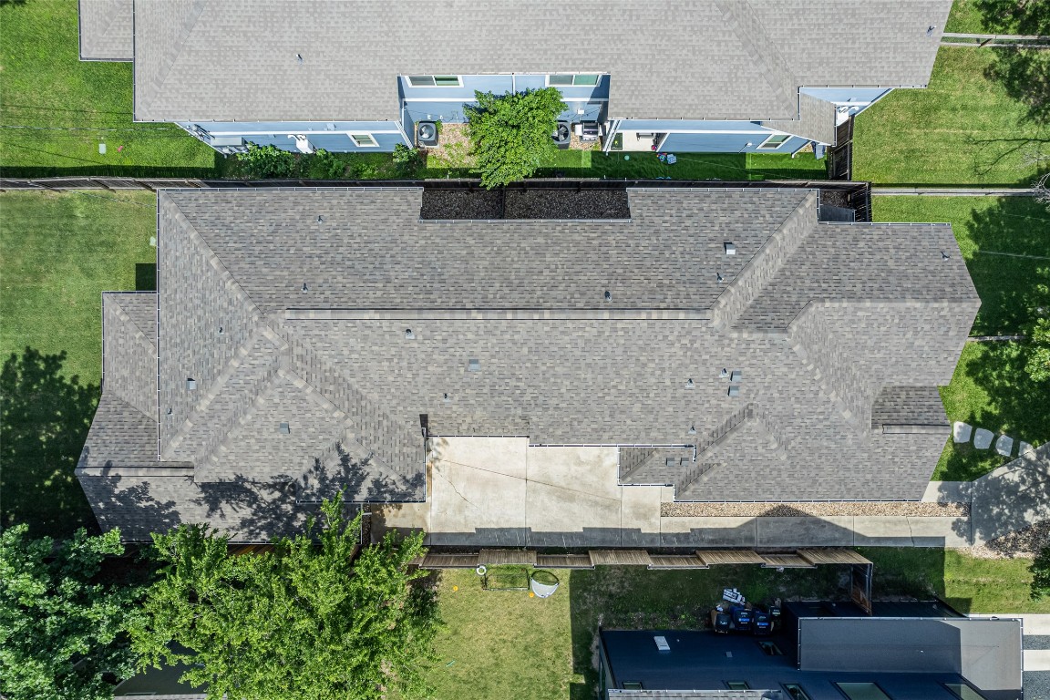 705 East 49th Street, Unit A Austin, TX 78751 - Photo 32 of 39 an aerial view of a house with a garden and a yard