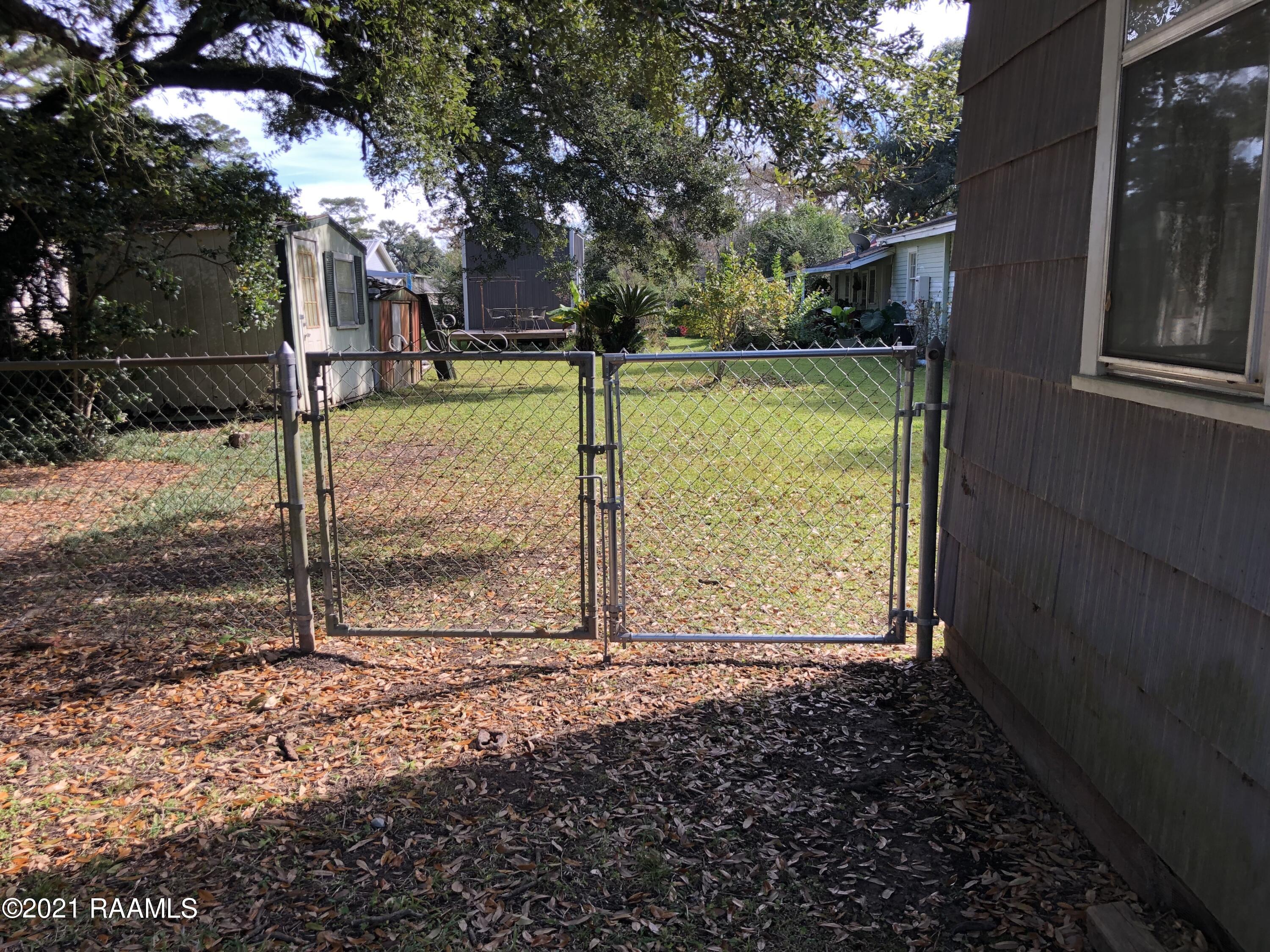 315 River Road Lafayette, LA 70501 - Photo 19 of 21 Backyard Double Gate Entry
