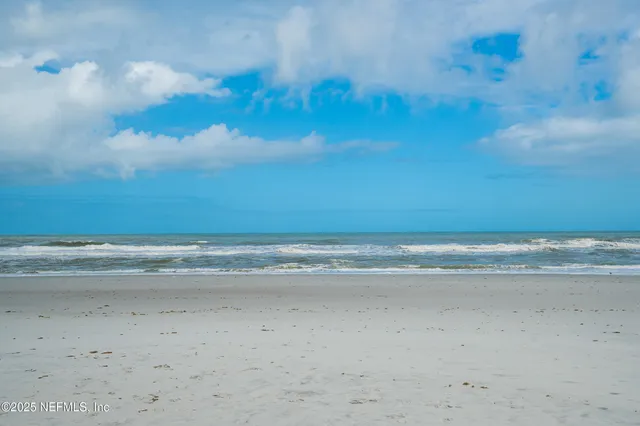 a view of a lake with a mountain