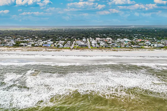 a kitchen with stainless steel appliances a refrigerator sink and cabinets